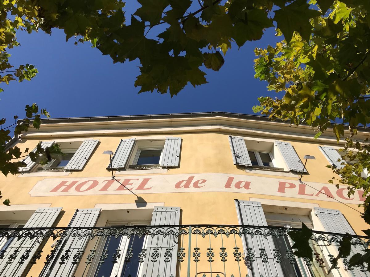 Bar Hotel De La Place Mezel Esterno foto